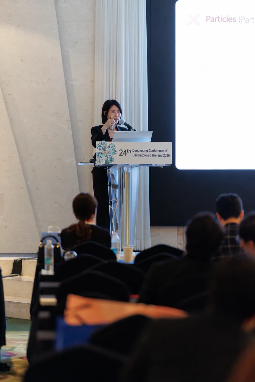 Wider view of the Daegyeong dermatology conference presentation