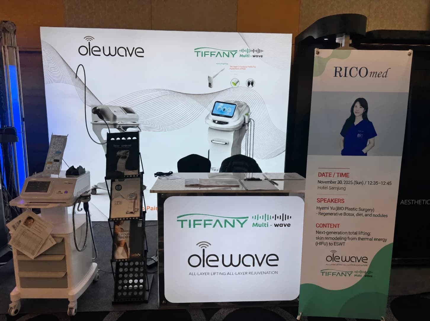 A conference display about acoustic wave treatment, with English signage