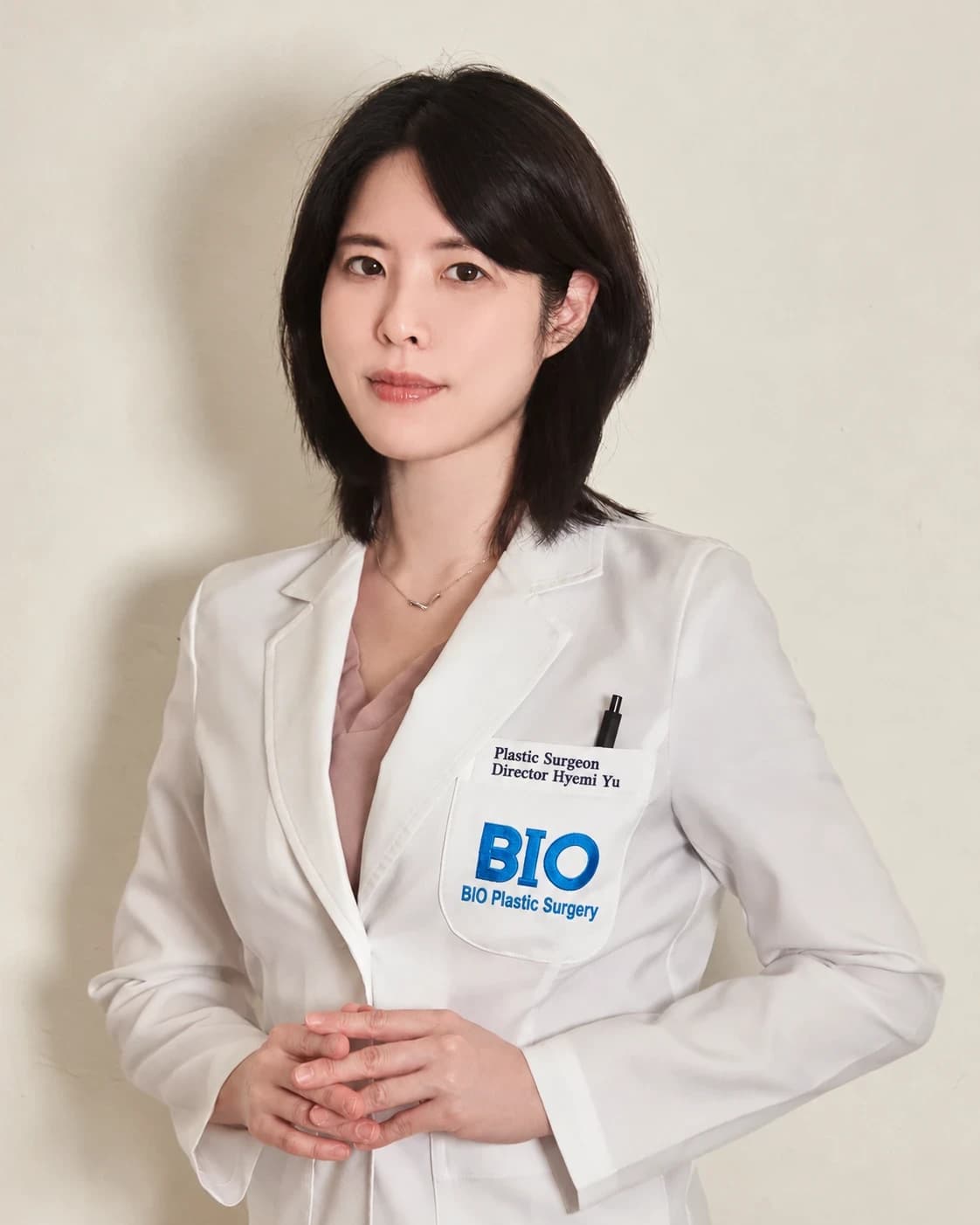 Dr. Hyemi Yu’s portrait from the original blog post, with English coat lettering